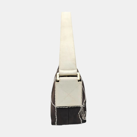 Chanel Black Canvas Shoulder Bag
White Stitching Gold Hardware