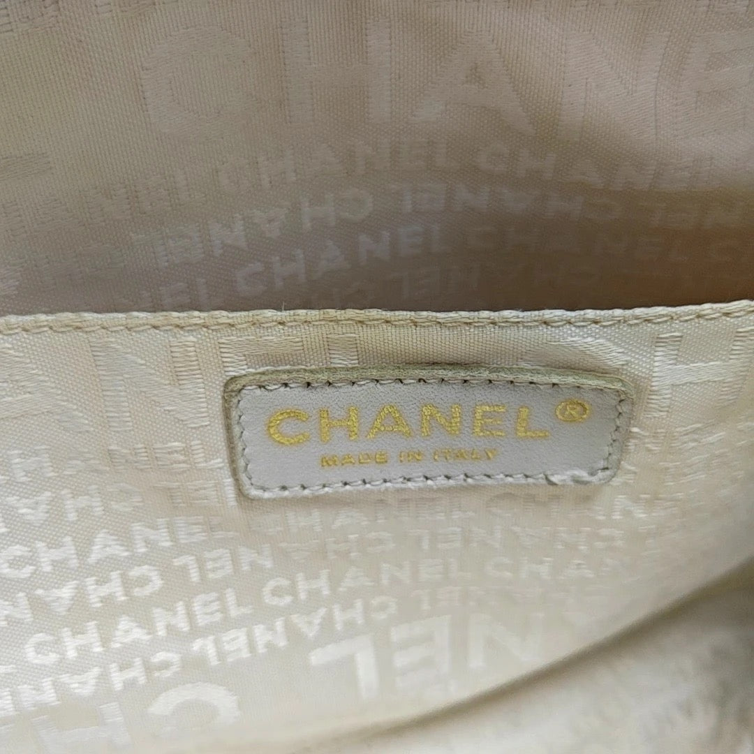 Chanel Black Canvas Shoulder Bag
White Stitching Gold Hardware